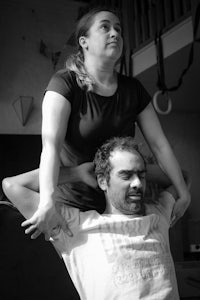 black and white photo of a man and woman in a room